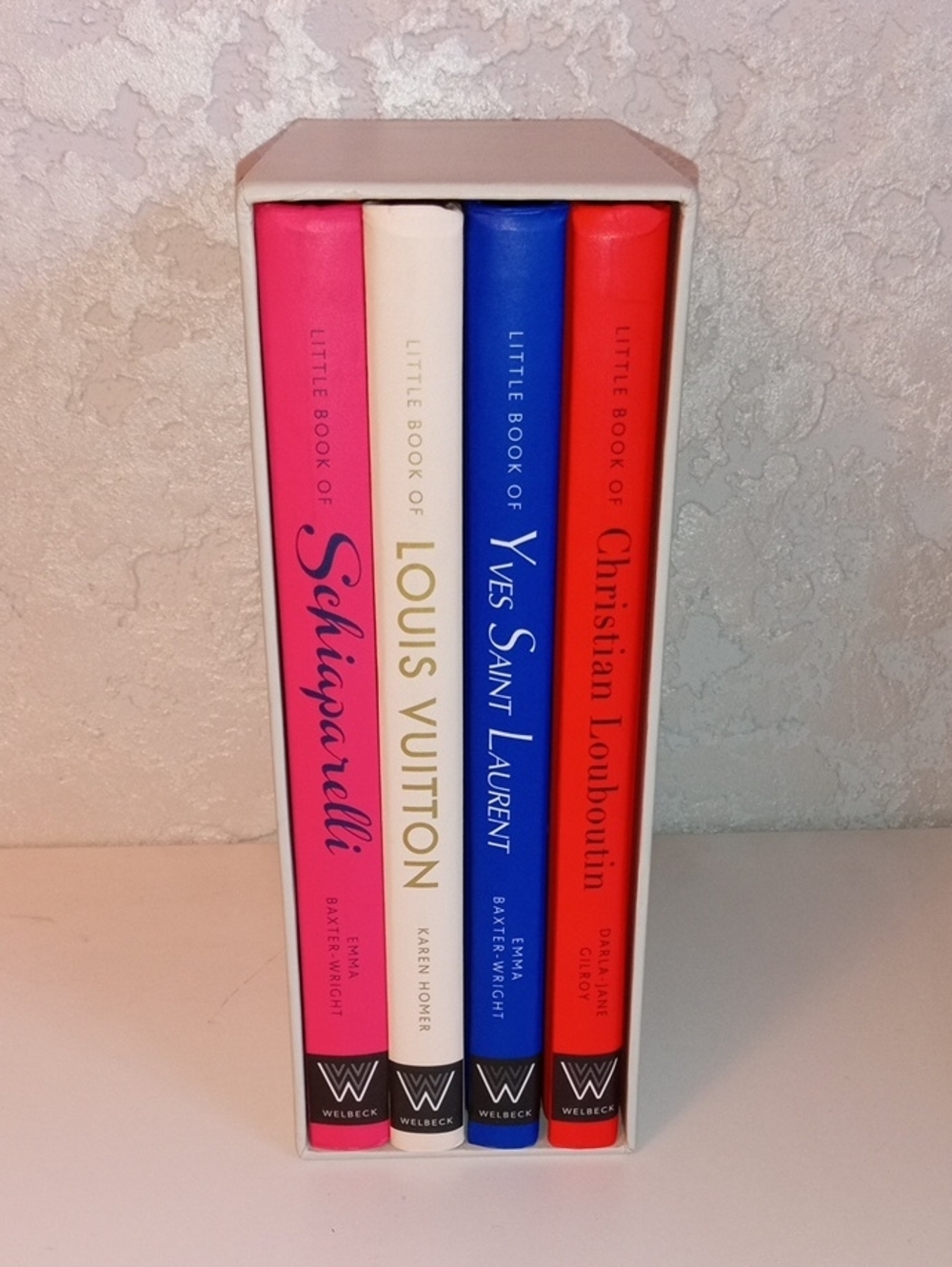 Set Of 4 Books Louis Vuitton, YSL, CL, and SCHIAPARELLI Coffee Table Books